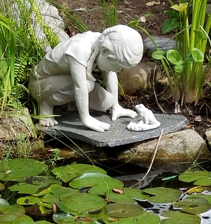 Sculpture of a girl and a frog