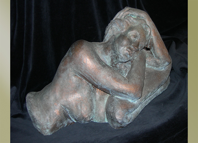 Sculpture of a female reclining