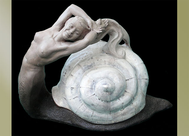 Sculpture of a mermaid and shell