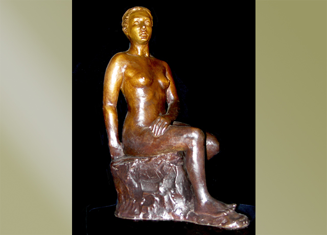 Sculpture of a seated woman